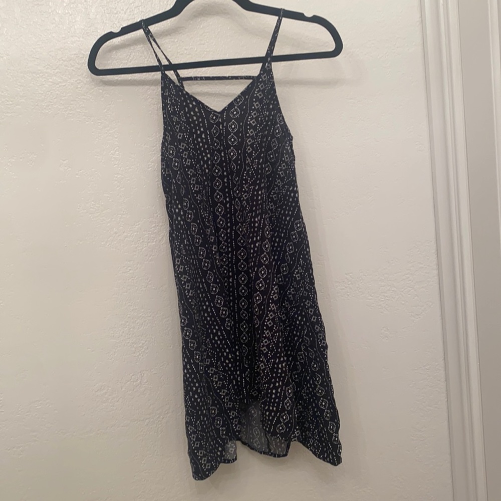 Little black dress with white detail.